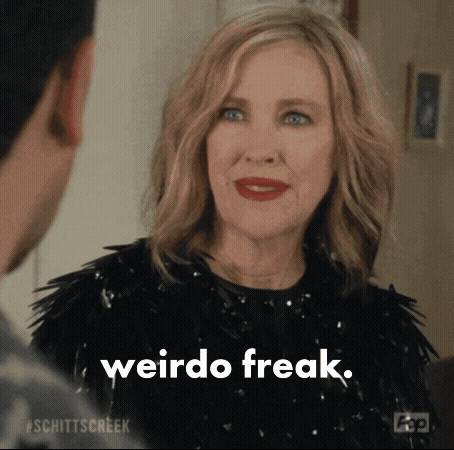 A Woman Is Talking To A Man And Says Weirdo Freak . GIF