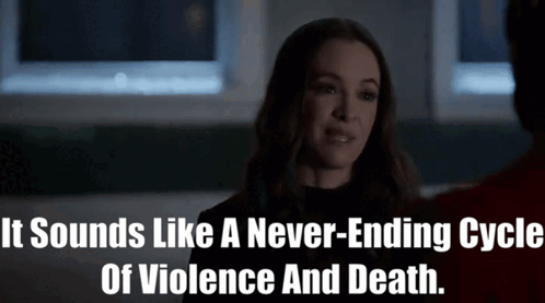 A Woman Is Talking To A Man In A Dark Room And Says It Sounds Like A Never-Ending Cycle Of Violence And Death GIF
