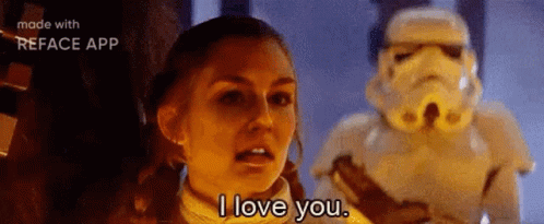 A Woman Is Talking To A Stormtrooper In A Star Wars Movie . GIF