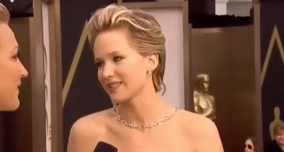Woman Talking To Another On Red Carpet GIF