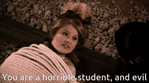 A Woman Is Tied Up With A Rope And The Words " You Are A Horrible Student And Evil " Are Next To Her GIF