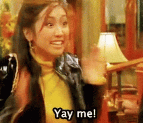 A Woman Is Waving Her Hand And Saying `` Yay Me ! '' GIF