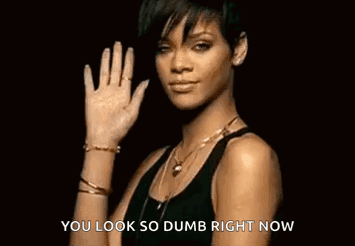 a woman is waving her hand and says `` you look so dumb right now ''