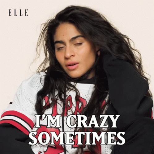 A Woman Is Wearing A Chicago Bulls Jersey And Says I 'M Crazy Sometimes GIF