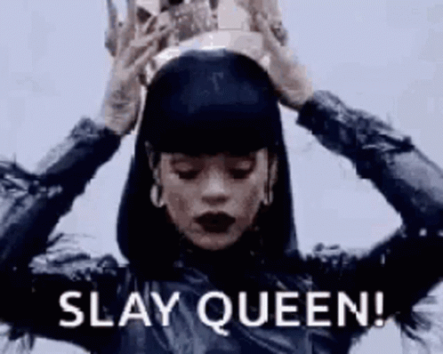A Woman Is Wearing A Crown On Her Head And Saying Slay Queen . GIF