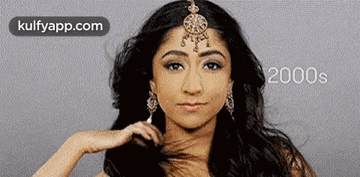 Woman With Headpiece And Earrings 2000S GIF