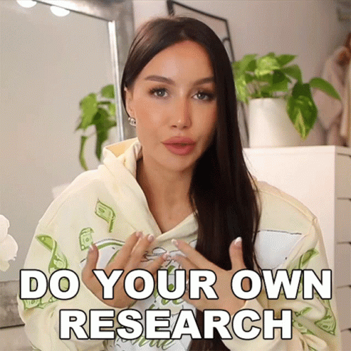 A Woman Is Wearing A Hoodie That Says " Do Your Own Research " GIF
