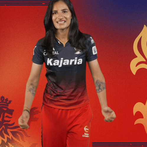 A Woman Is Wearing A Kajaria Jersey GIF