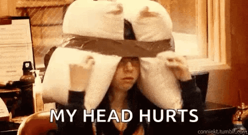 A Woman Is Wearing A Pillow On Her Head And The Words `` My Head Hurts '' Are Written Above Her . GIF