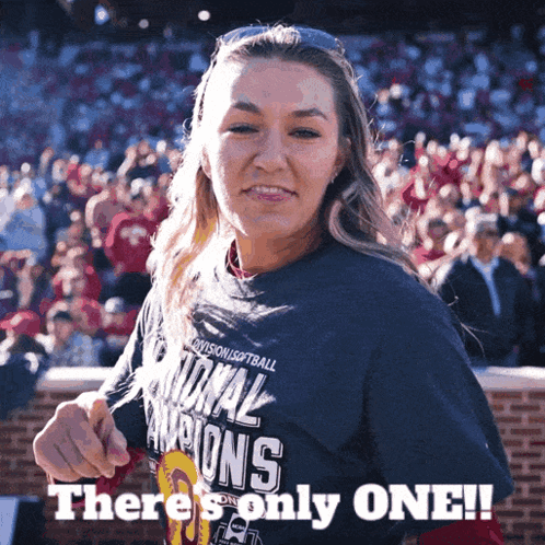 A Woman Is Wearing A Shirt That Says National Champions On It GIF