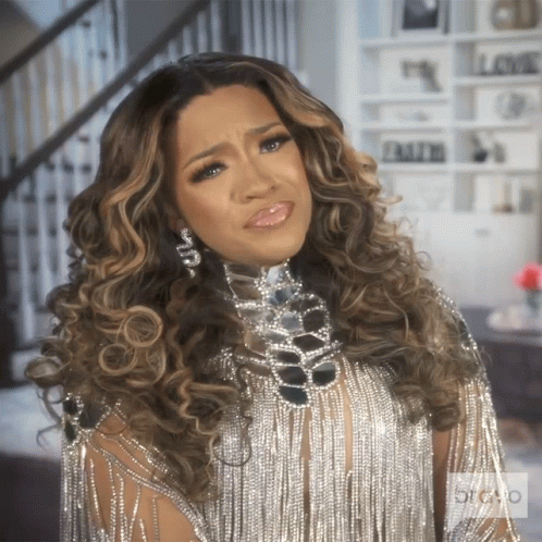 Woman In Silver Fringe Dress With Rhinestone Necklace GIF
