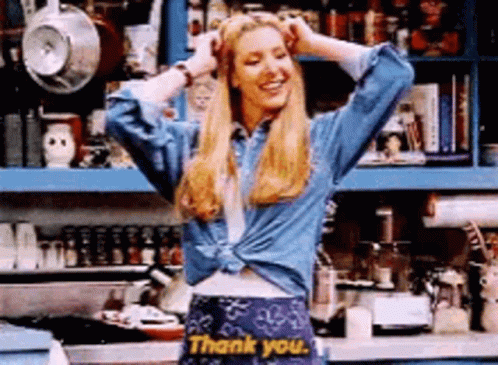 A Woman Is Wearing A Skirt That Says Thank You . GIF