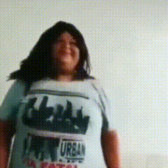 A Woman Is Wearing A T-Shirt That Says Urban GIF