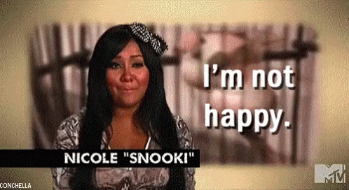 A Woman Is Wearing A Tiara And Saying `` I 'M Not Happy '' . GIF