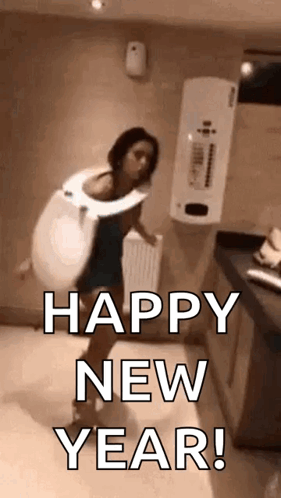 A Woman Is Wearing A Toilet Seat And Dancing In A Bathroom . GIF