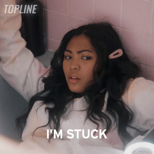 A Woman Laying In A Bathtub With The Words " I 'M Stuck " Above Her GIF