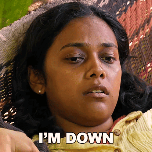 A Woman Laying In A Hammock With The Words I 'M Down Above Her GIF