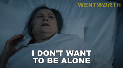 A Woman Laying In A Hospital Bed With The Words " I Don 'T Want To Be Alone " GIF