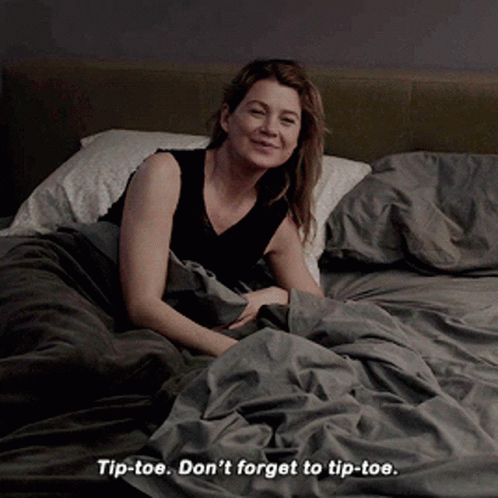 A Woman Laying On A Bed With The Words Tip-Toe Don 'T Forget To Tip-Toe Below Her GIF