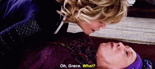 A Woman Laying On The Floor Talking To Another Woman With The Words Oh Grace What GIF