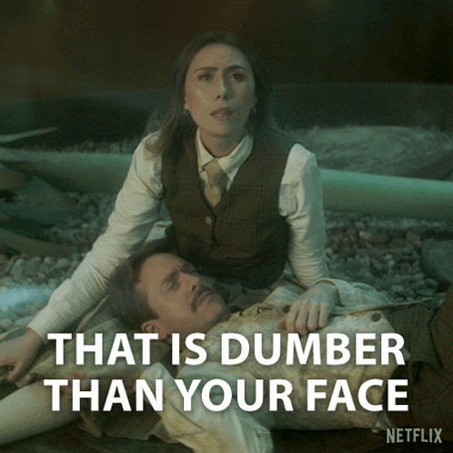 A Woman Laying On Top Of A Man With The Words That Is Dumber Than Your Face On The Bottom GIF