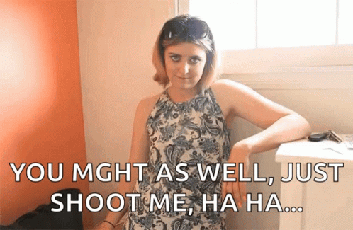 A Woman Leaning Against A Wall With A Caption That Says You Might As Well Just Shoot Me GIF