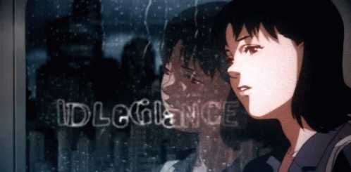 A Woman Looking Out A Window With The Word Idlegance Written On The Glass GIF