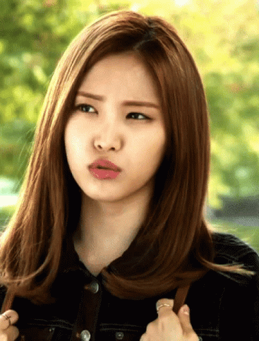 a woman making a funny face with her mouth open