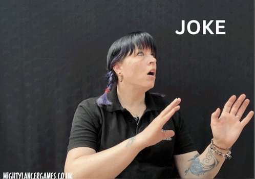 A Woman Making A Funny Face With The Word Joke Written Above Her GIF