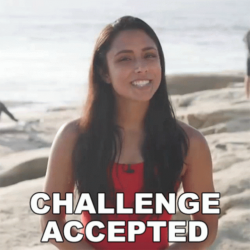 Woman On Beach With Challenge Accepted Behind GIF
