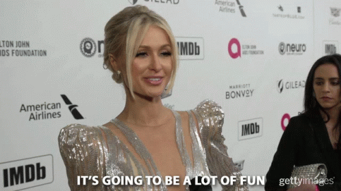 A Woman On A Red Carpet With The Words It 'S Going To Be A Lot Of Fun Written Below Her GIF