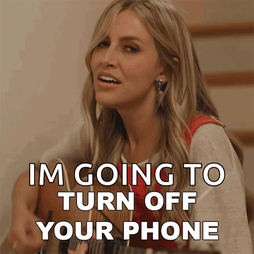 A Woman Playing A Guitar With The Words Im Going To Turn Off Your Phone GIF