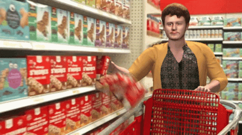A Woman Pushing A Shopping Cart In A Grocery Store With Boxes Of S'mores In The Background GIF