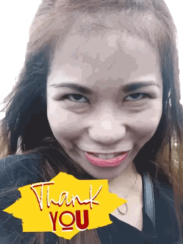 a woman 's face is behind a yellow thank you sticker
