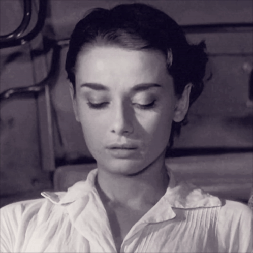 Black And White Photo Of Woman With Eyes Closed GIF