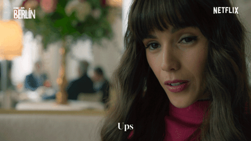 A Woman 'S Face Is Shown In A Netflix Advertisement For Berlin GIF