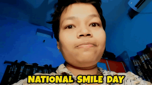 A Woman 'S Face Is Shown With The Words National Smile Day Above It GIF