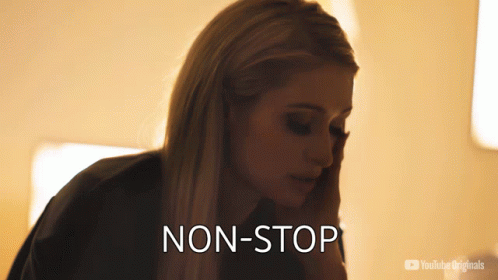 A Woman 'S Face Is Shown With The Words Non-Stop Behind Her GIF