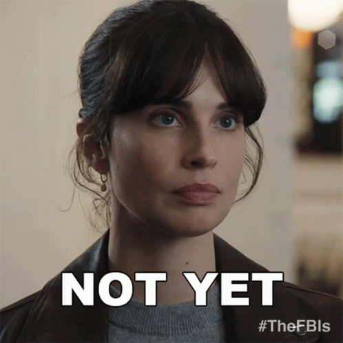 A Woman 'S Face Is Shown With The Words Not Yet Above Her GIF