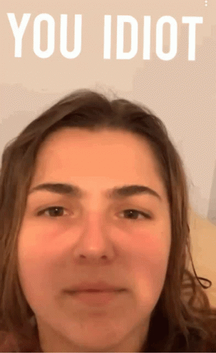 A Woman 'S Face Is Shown With The Words " You Idiot " Above It GIF