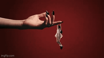 A Woman 'S Hand Is Holding A Smaller Woman 'S Hand With Imgflip.com At The Bottom GIF
