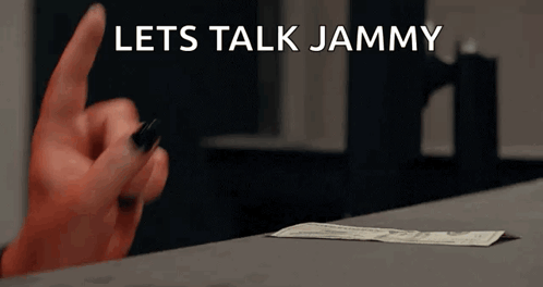 a woman 's hand is pointing at a dollar bill that says let 's talk jammy on it