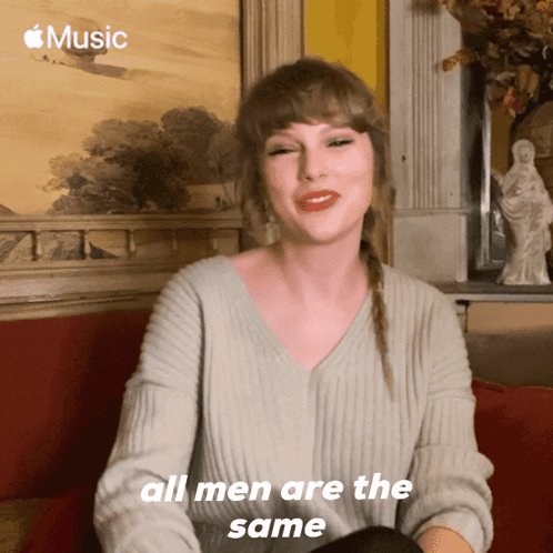 A Woman Says All Men Are The Same In Front Of A Picture GIF