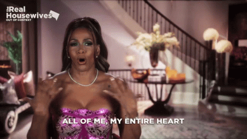 A Woman Says " All Of Me My Entire Heart " In Front Of A Real Housewives Logo GIF