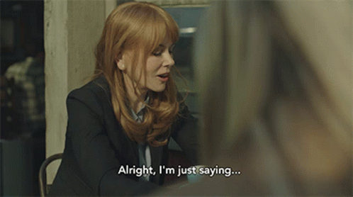 A Woman Says Alright I 'M Just Saying While Sitting At A Table GIF