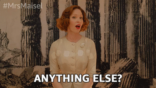 A Woman Says Anything Else In Front Of A Drawing GIF