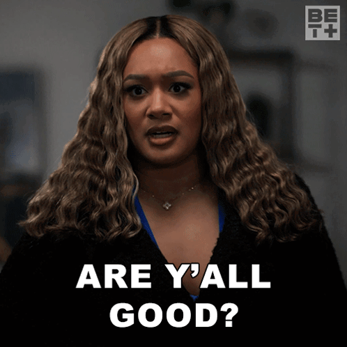 A Woman Says " Are Y'all Good " In Front Of A Black Background GIF