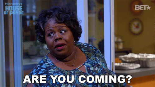 A Woman Says " Are You Coming " In Front Of A Window GIF