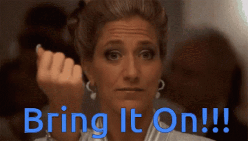 A Woman Says Bring It On In Blue GIF