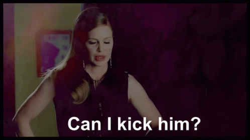 A Woman Says Can I Kick Him In A Purple Room GIF